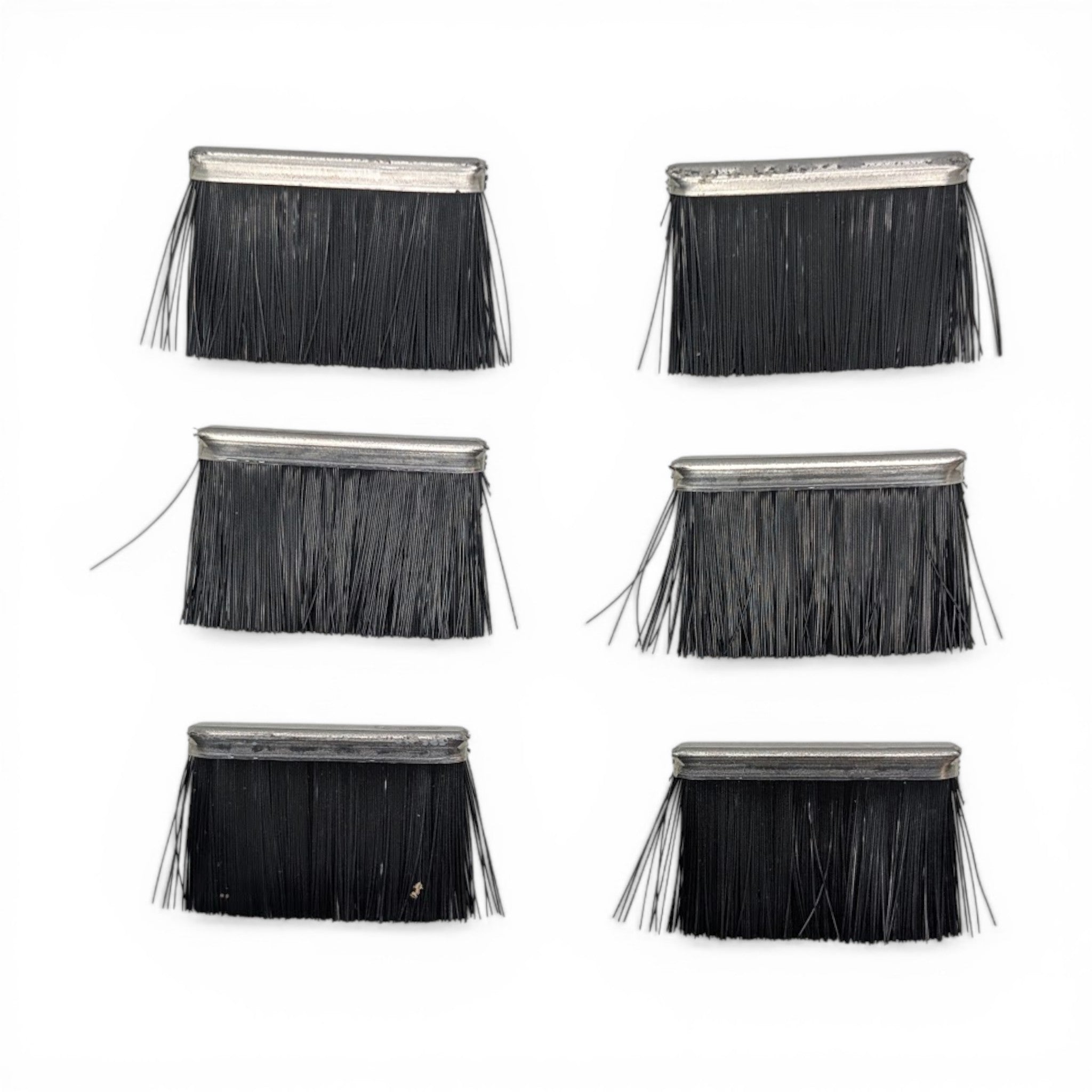 Six replacement air brush kit bristle strips for garden machinery tools on white background